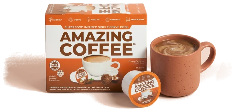 The Amazing Coffee 24-count pod carton beside a mug of cocoa-flavored coffee and a single pod